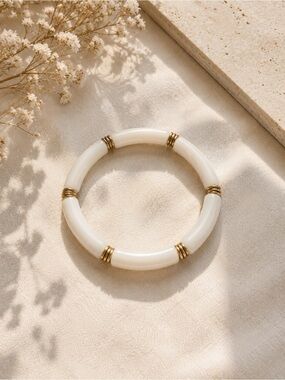 Elegant White and Gold Tubular Bracelet